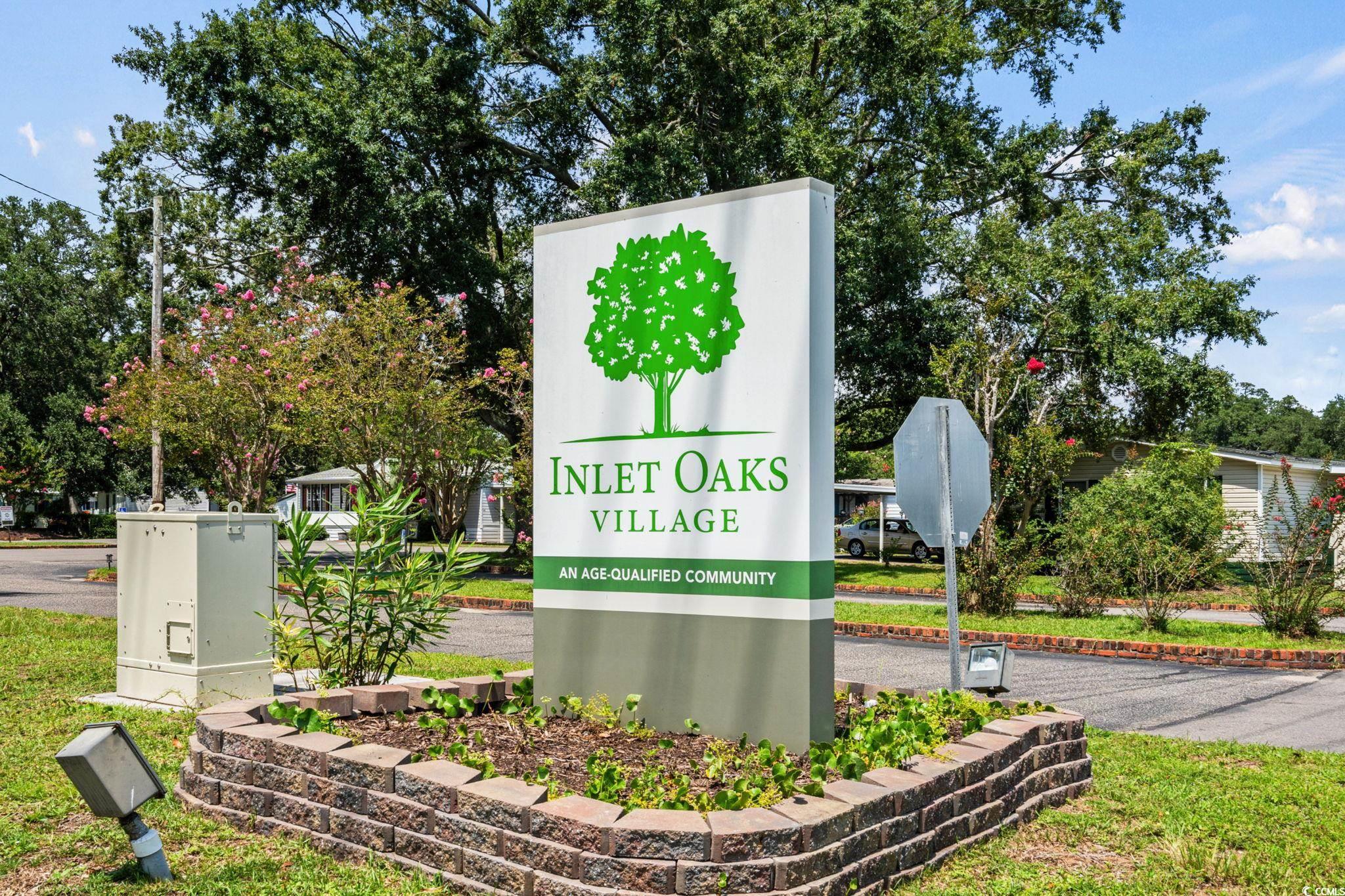 125 Moultrie Court Murrells Inlet, SC 29576 - Photo 31 of 40 View of community sign