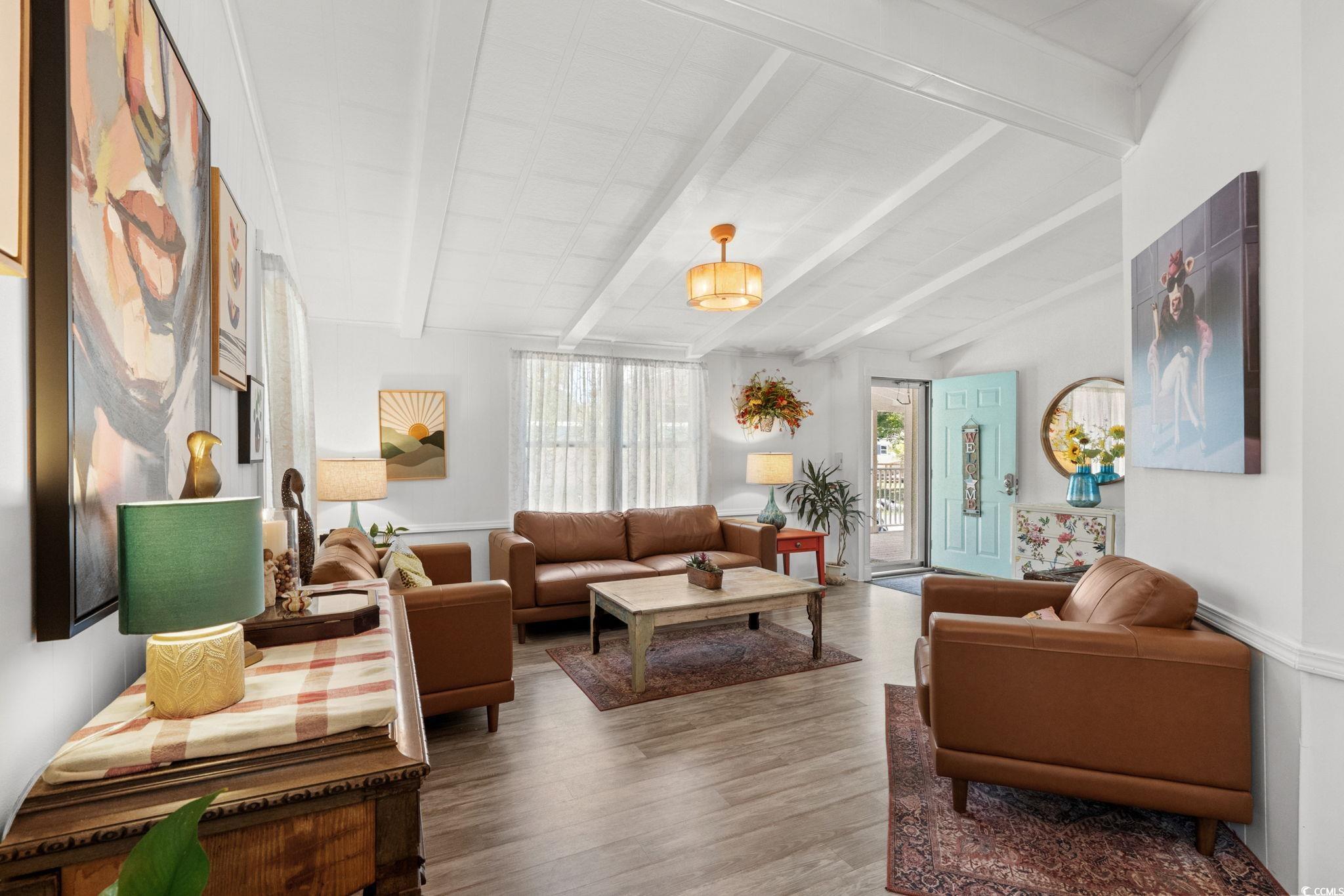125 Moultrie Court Murrells Inlet, SC 29576 - Photo 6 of 40 Living room with wood finished floors