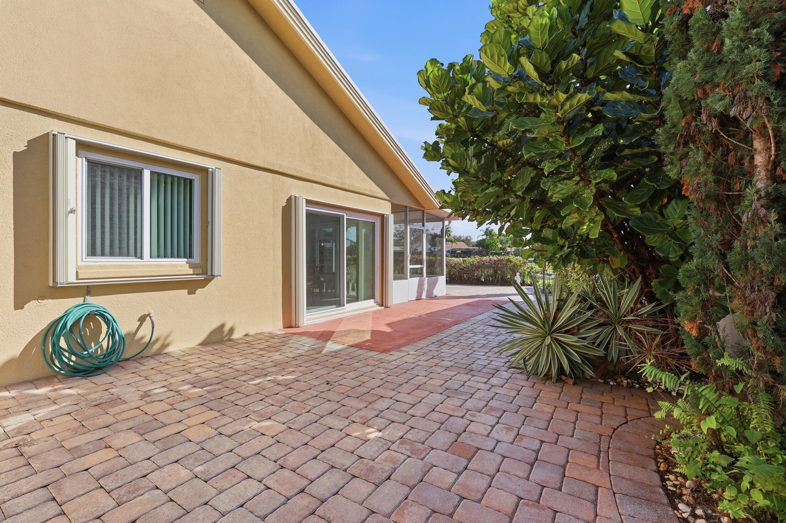 117 Sea Steppes Court Jupiter, FL 33477 - Photo 46 of 61 Side Patio