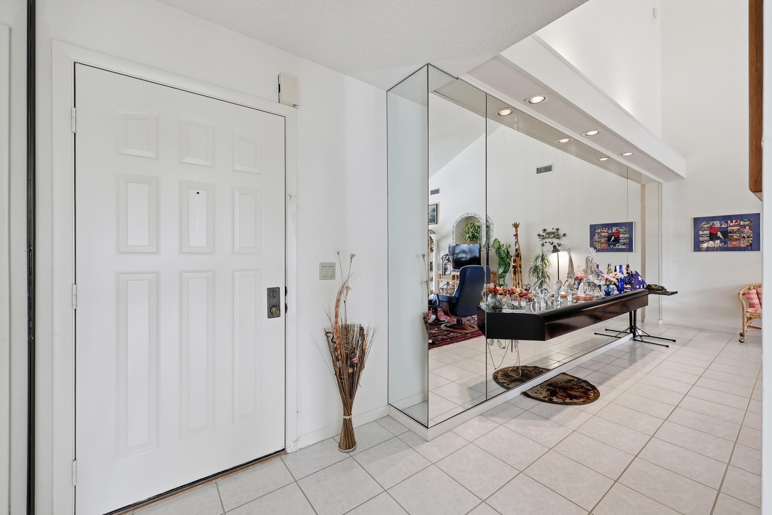 117 Sea Steppes Court Jupiter, FL 33477 - Photo 7 of 61 foyer