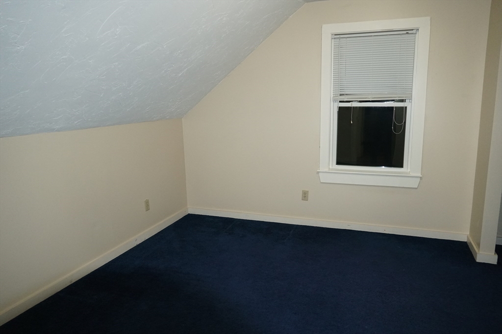 39 Burt Street, Unit 1 Berkley, MA 02779 - Photo 14 of 19 an empty room with a window