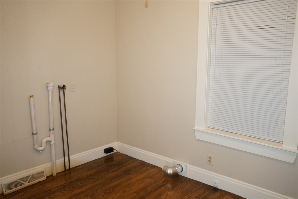 39 Burt Street, Unit 1 Berkley, MA 02779 - Photo 18 of 19 a view of small space with racks on the wall