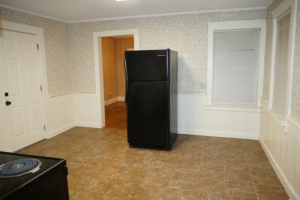 39 Burt Street, Unit 1 Berkley, MA 02779 - Photo 3 of 19 a view of an empty room