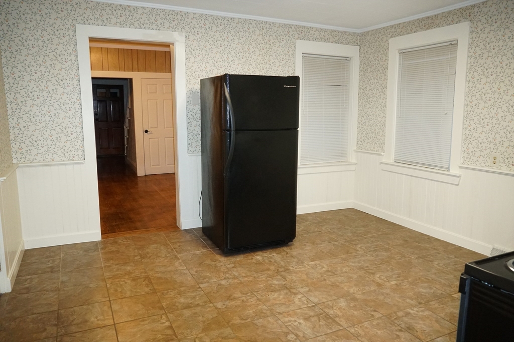 39 Burt Street, Unit 1 Berkley, MA 02779 - Photo 4 of 19 a view of a refrigerator in a kitchen
