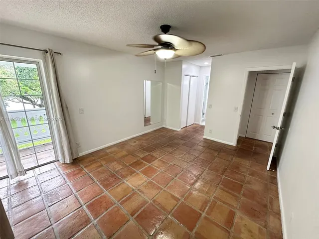 a view of a livingroom with a large window