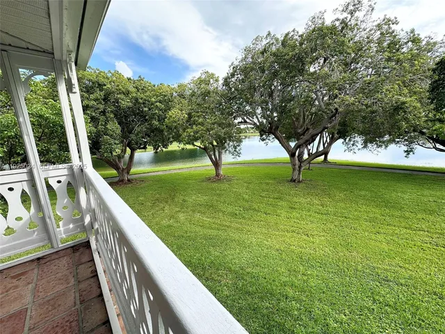 a view of swimming pool from a balcony