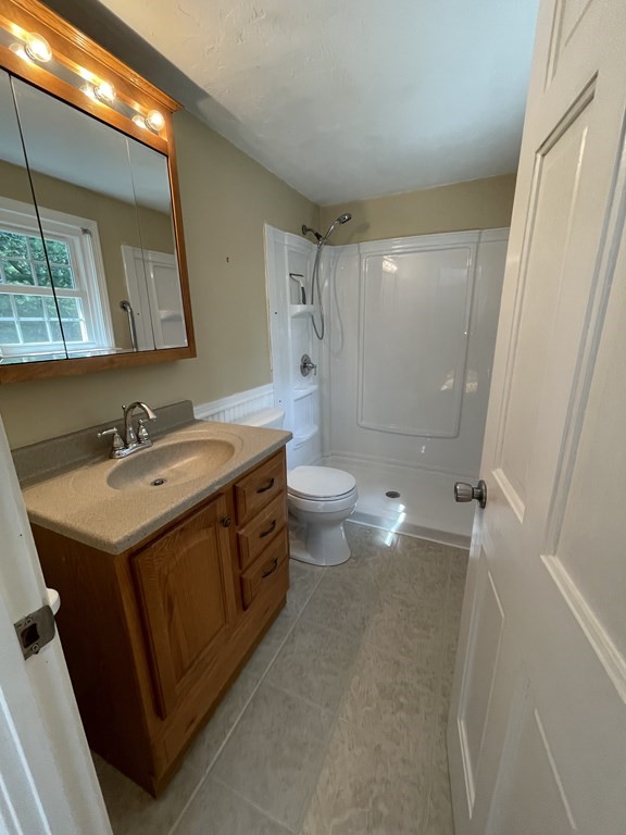 75 Moritz Road Marshfield, MA 02050 - Photo 13 of 18 a bathroom with a sink a toilet and shower