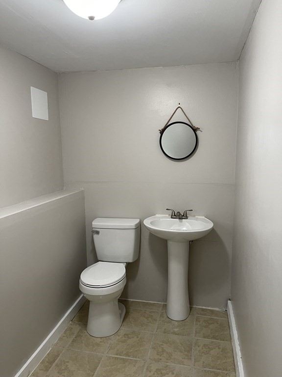 75 Moritz Road Marshfield, MA 02050 - Photo 16 of 18 a bathroom with a toilet sink and mirror