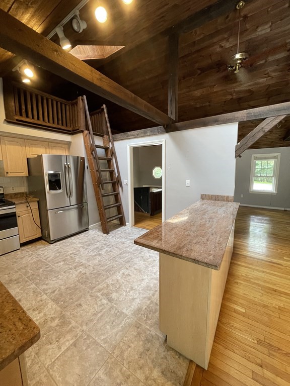 75 Moritz Road Marshfield, MA 02050 - Photo 7 of 18 a view of a hallway with the kitchen