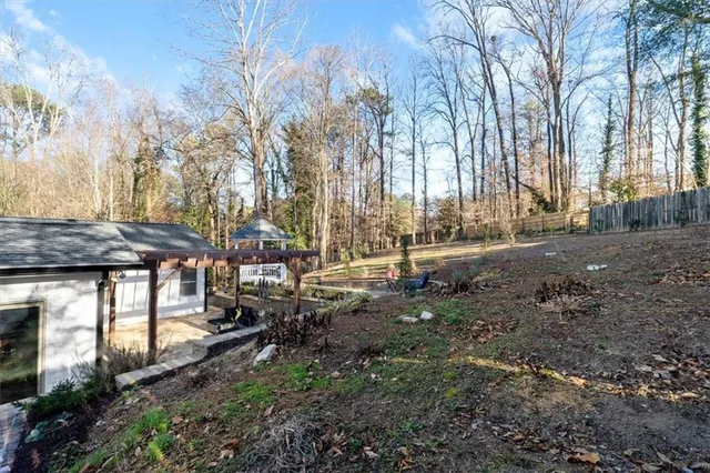 a backyard of a house with lots of green space