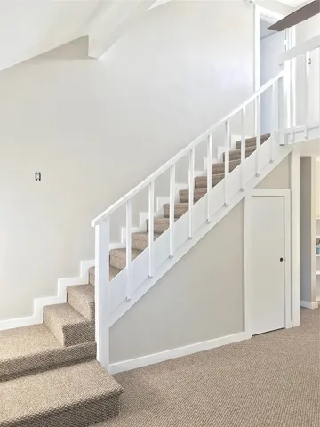 a room with cabinets and window