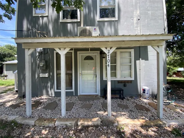 a view of a house with a porch
