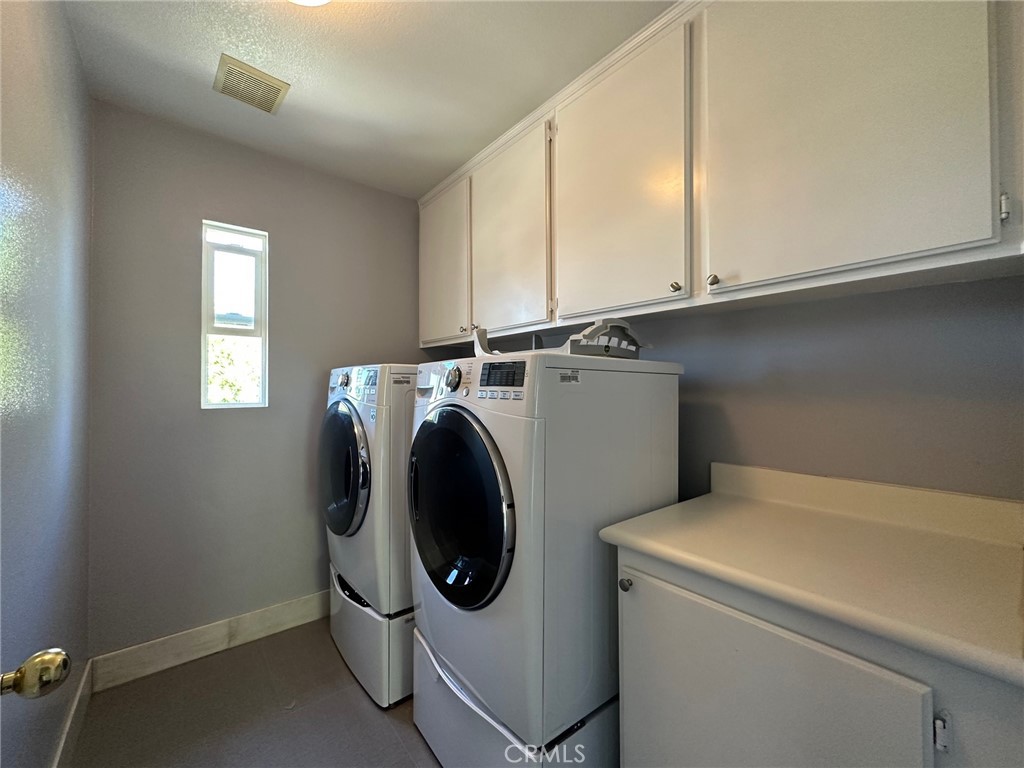 33 Sagebrush Irvine, CA 92618 - Photo 19 of 22 a utility room with dryer and washer