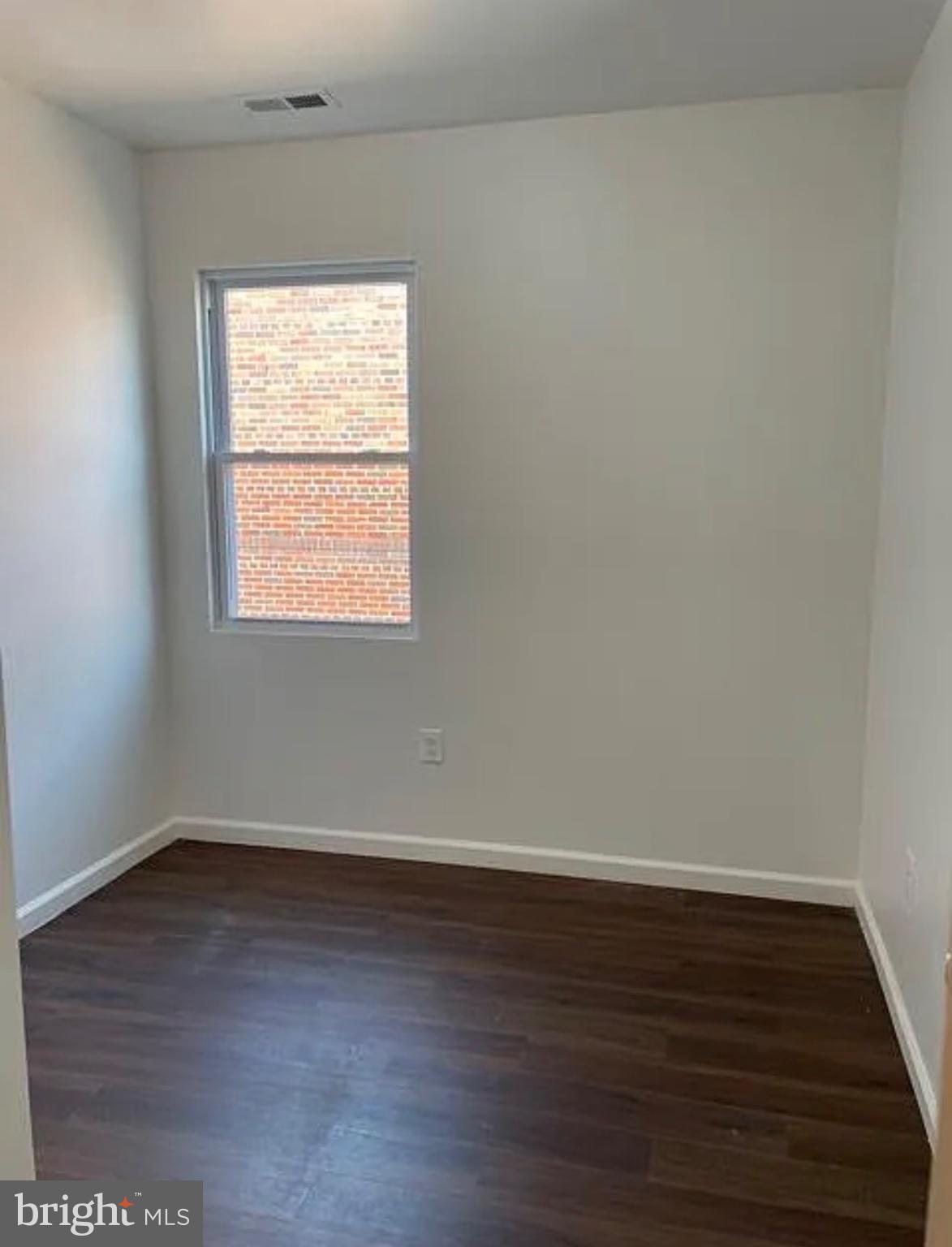5822 9th Street Northwest, Unit 4 Washington, DC 20011 - Photo 7 of 10 Bright and airy blank canvas room.
