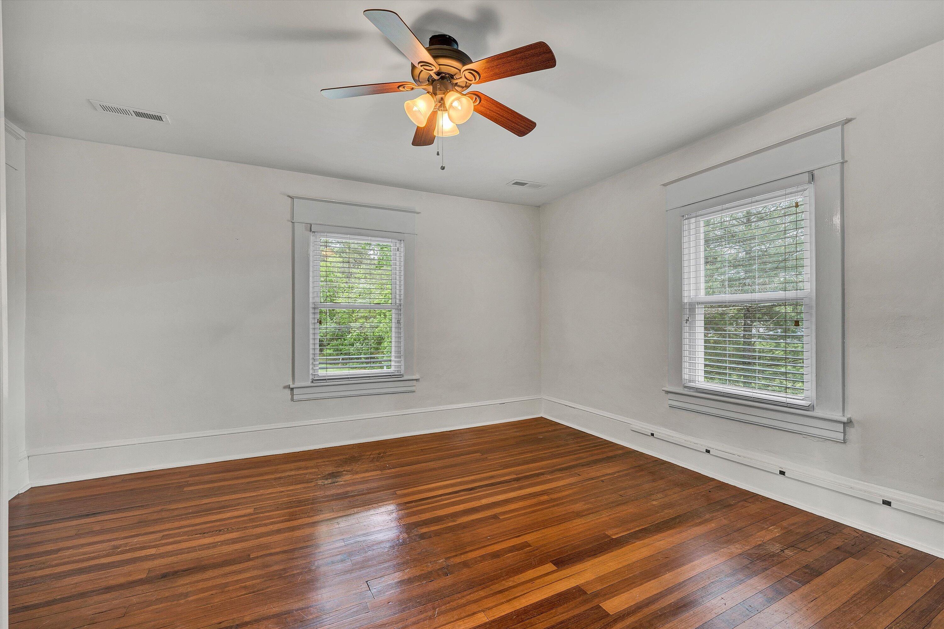 341 Springwood Road Fincastle, VA 24090 - Photo 35 of 55 wooden floor in an empty room with a window