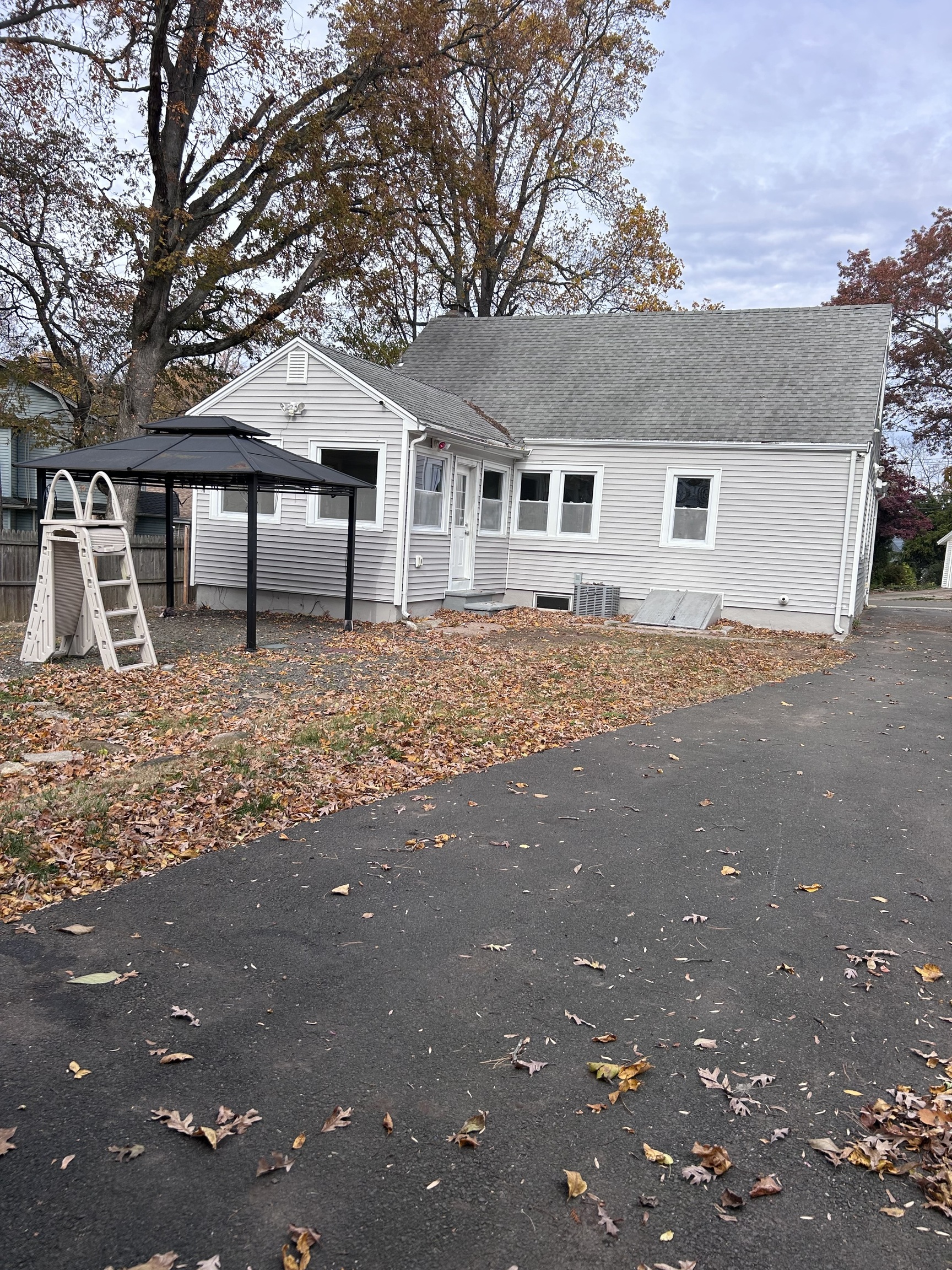 36 Forest Hills Road West Haven, CT 06516 - Photo 3 of 22 a front view of a house with a yard