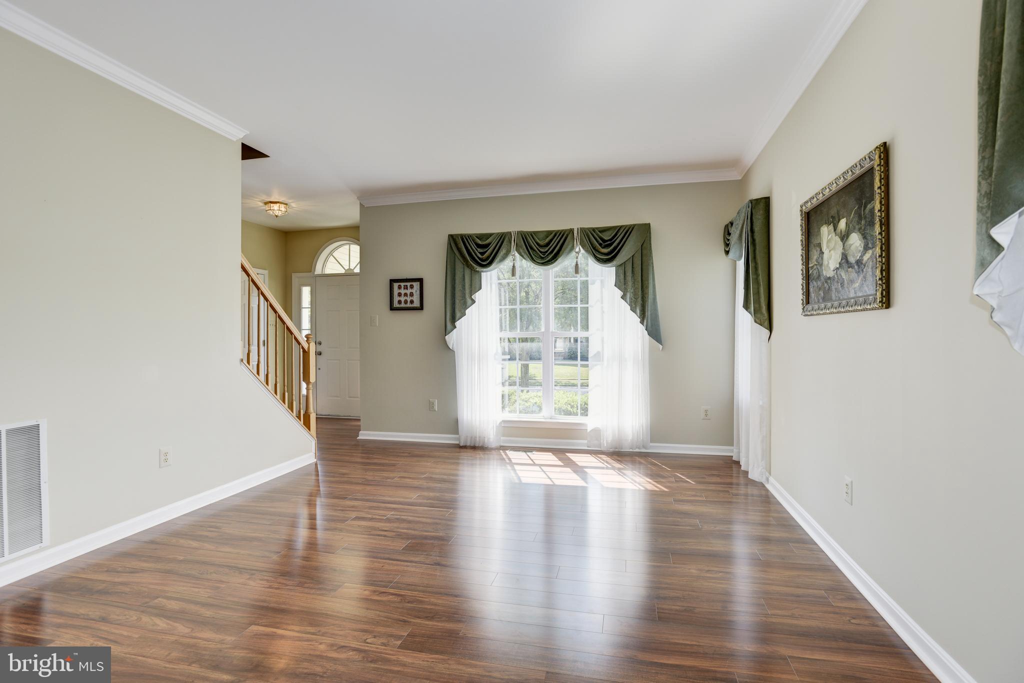 9506 Good Spring Drive Perry Hall, MD 21128 - Photo 6 of 50 LIVING ROOM W/CROWN MOLDING & HARDWOOD FLOORS