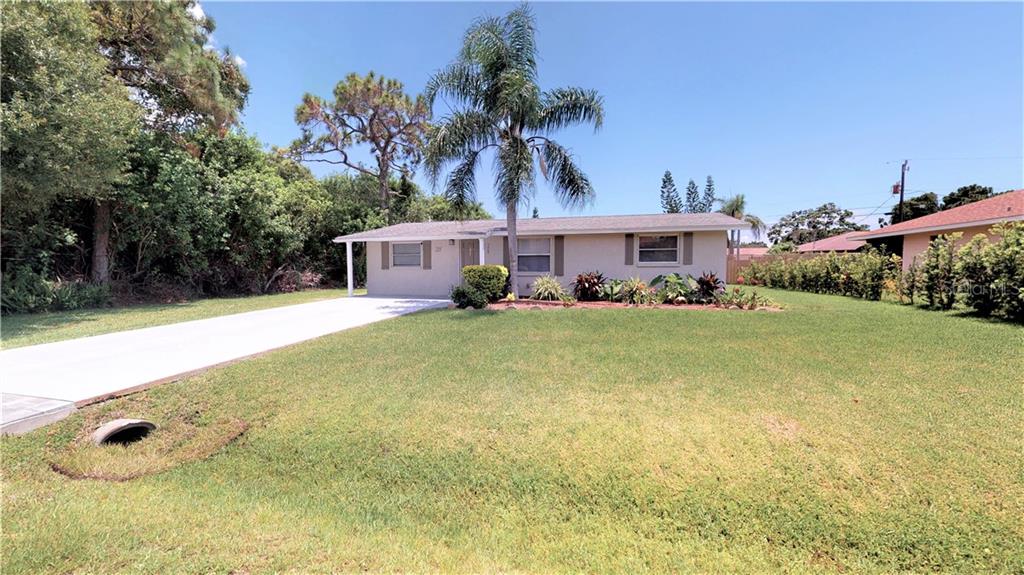 211 Shell Road Venice, FL 34293 - Photo 1 of 1 Front of house, nice size front yard. Notice no home on the left