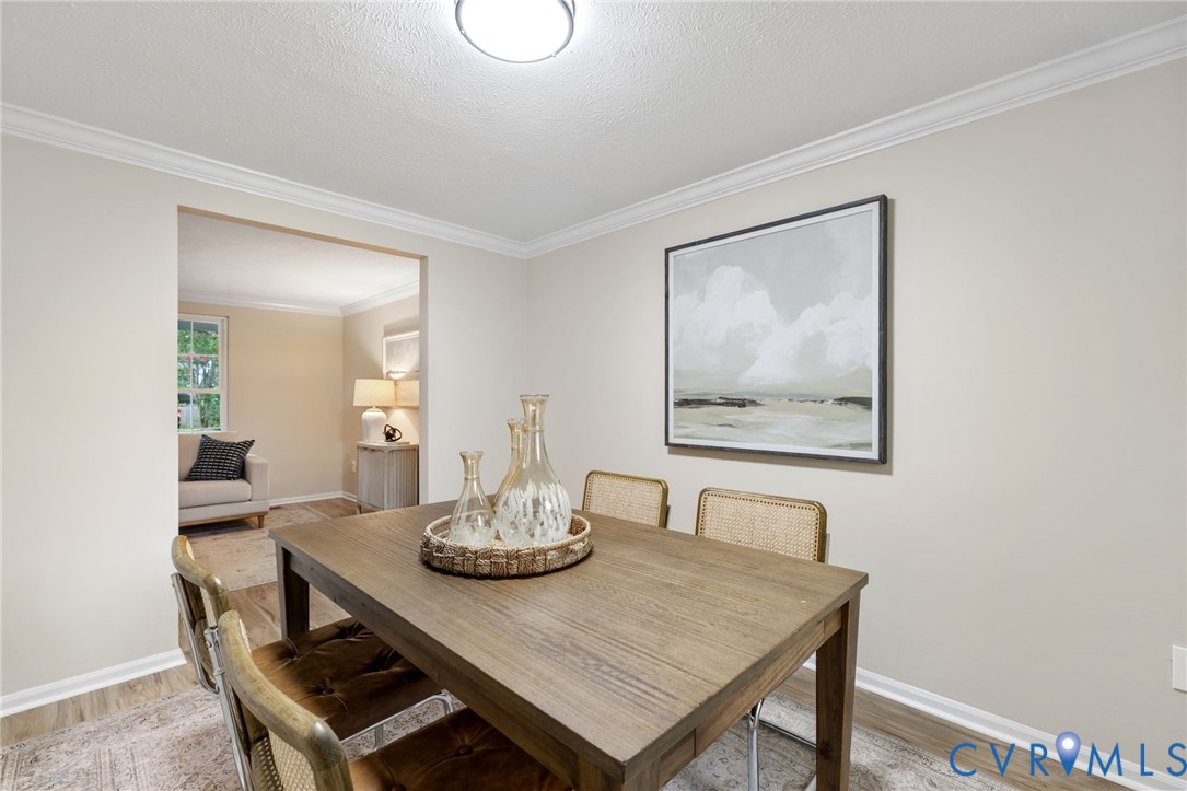 9808 Brenspark Road Chesterfield, VA 23832 - Photo 9 of 28 a view of a dining room with furniture