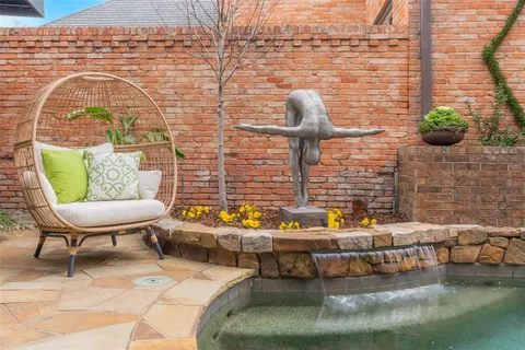 a view of swimming pool with lounge chair