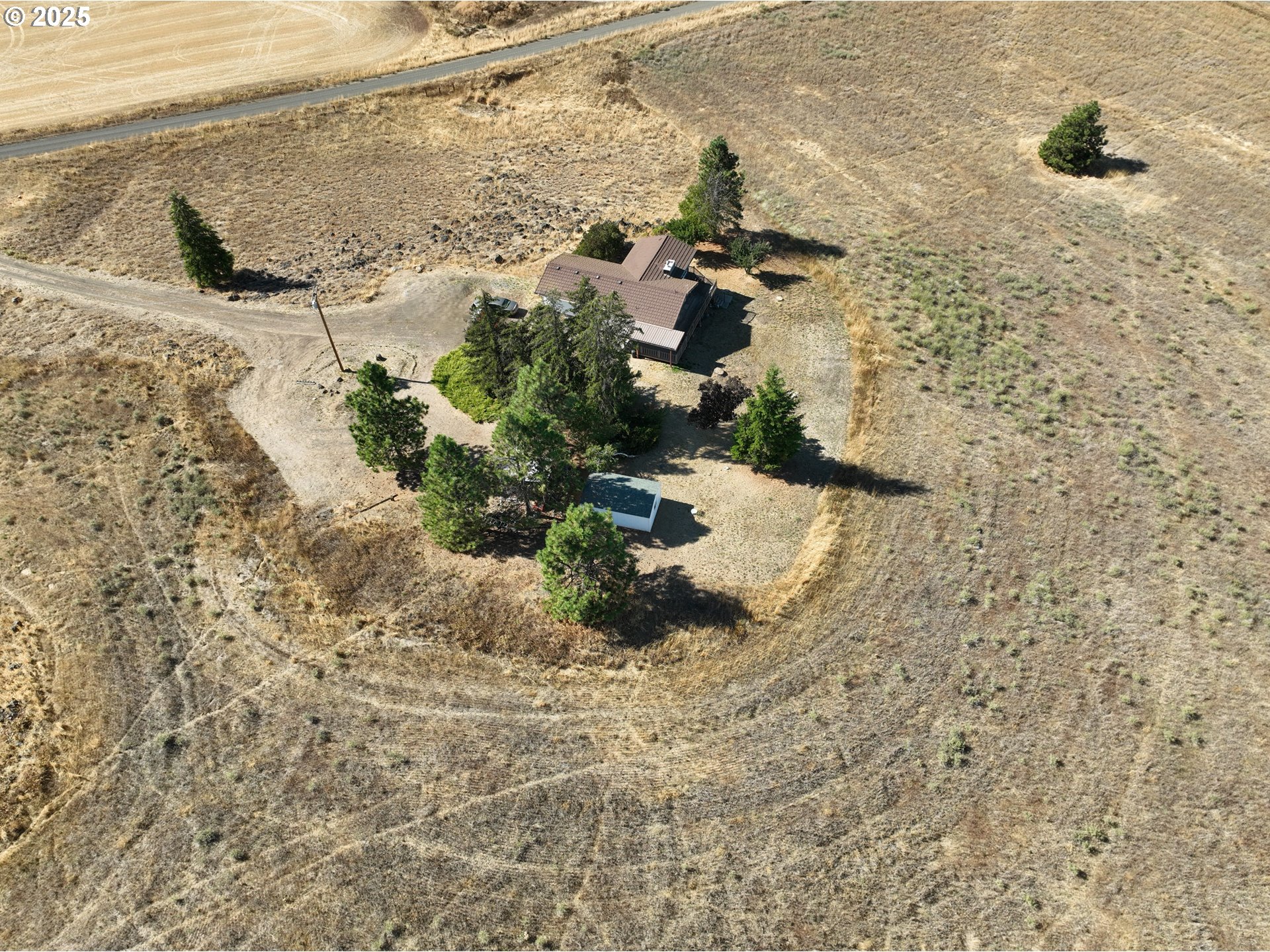 44 North Harris Road Goldendale, WA 98620 - Photo 31 of 36 a view of a backyard of the house