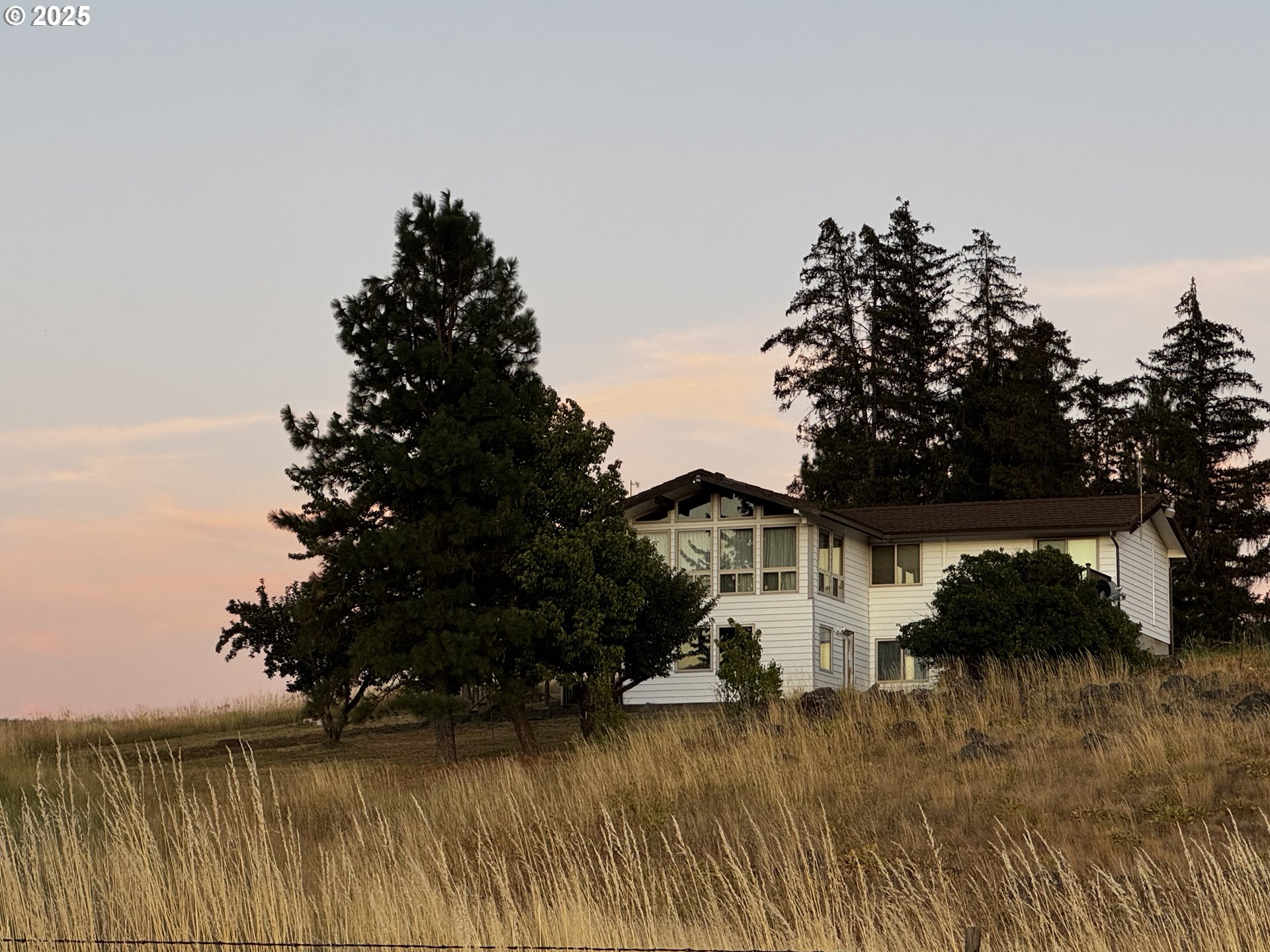 44 North Harris Road Goldendale, WA 98620 - Photo 5 of 36 a view of a house with a yard