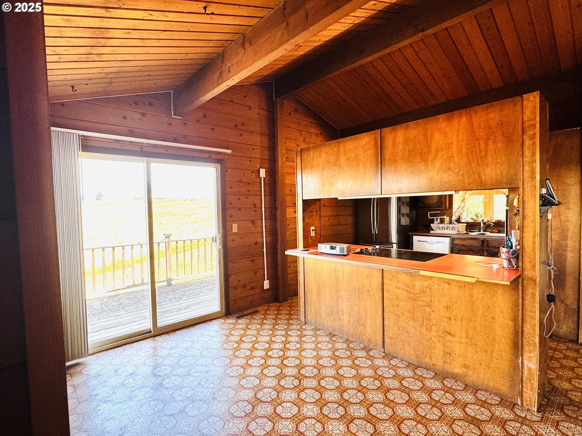 44 North Harris Road Goldendale, WA 98620 - Photo 10 of 36 a large kitchen with a large window and a sink