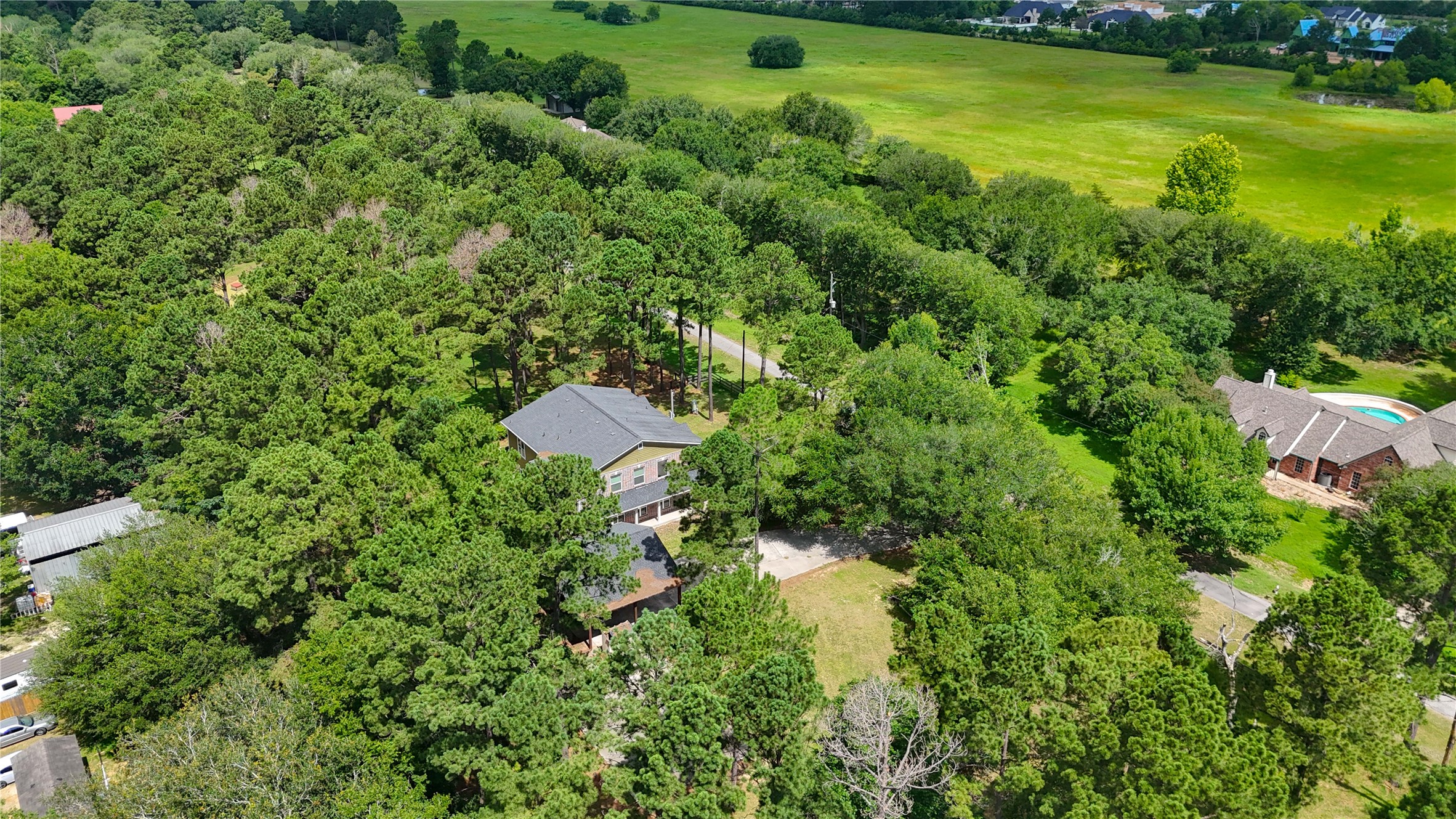 20531 Faye Tomball, TX 77377 - Photo 8 of 43 an aerial view of residential house with outdoor space and trees all around