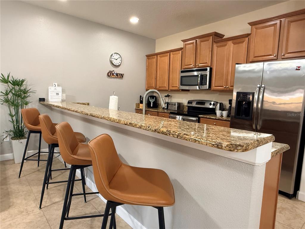 8977 Bismarck Palm Road Kissimmee, FL 34747 - Photo 7 of 60