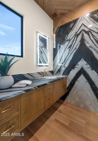 an aerial view of a house with garden space and sitting space