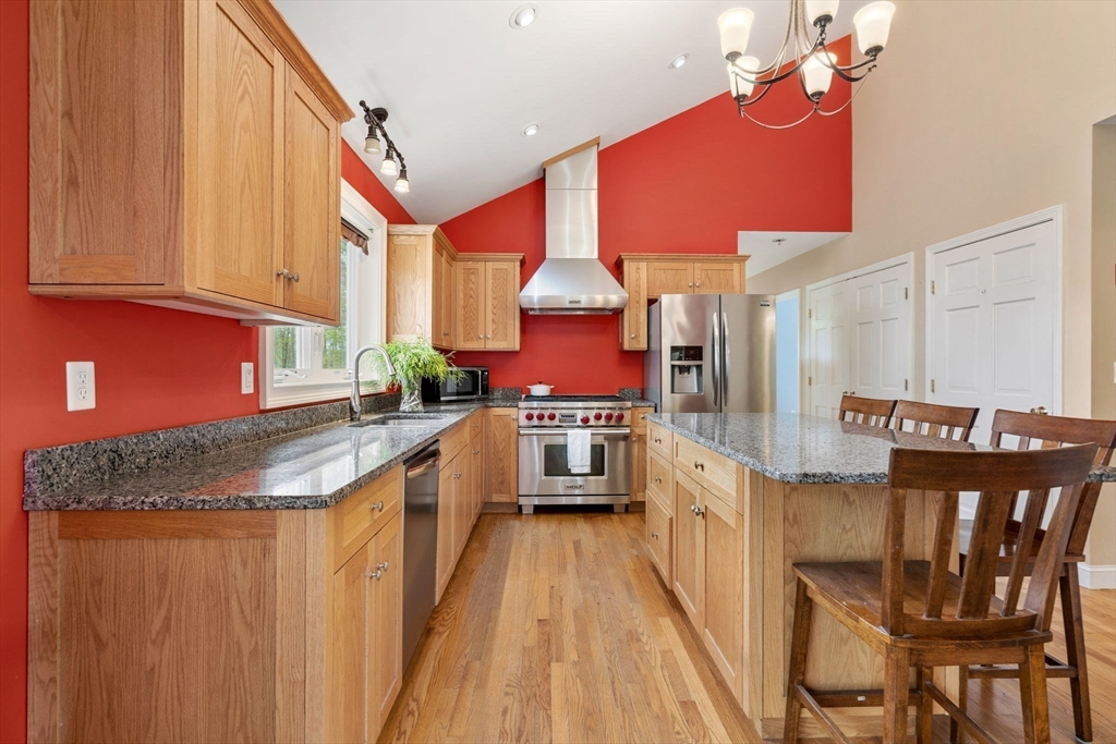 3 Brown Road Townsend, MA 01469 - Photo 11 of 41 a kitchen with stainless steel appliances granite countertop a stove a sink and a refrigerator