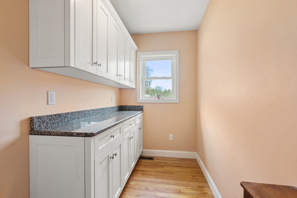 3 Brown Road Townsend, MA 01469 - Photo 14 of 41 a kitchen with granite countertop white cabinets and a sink