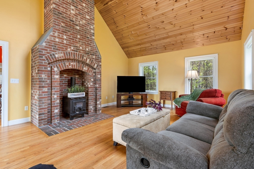 3 Brown Road Townsend, MA 01469 - Photo 15 of 41 a living room with furniture and a fireplace