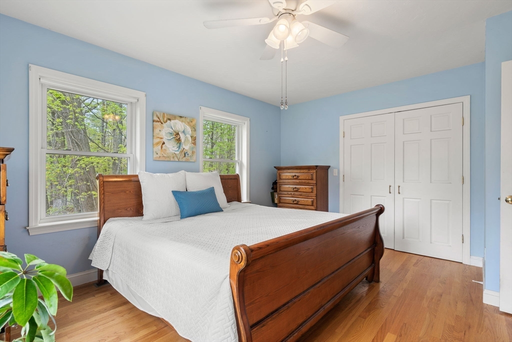 3 Brown Road Townsend, MA 01469 - Photo 18 of 41 a bed sitting in a bedroom next to a window