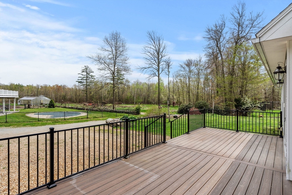 3 Brown Road Townsend, MA 01469 - Photo 21 of 41 a view of a backyard and trees