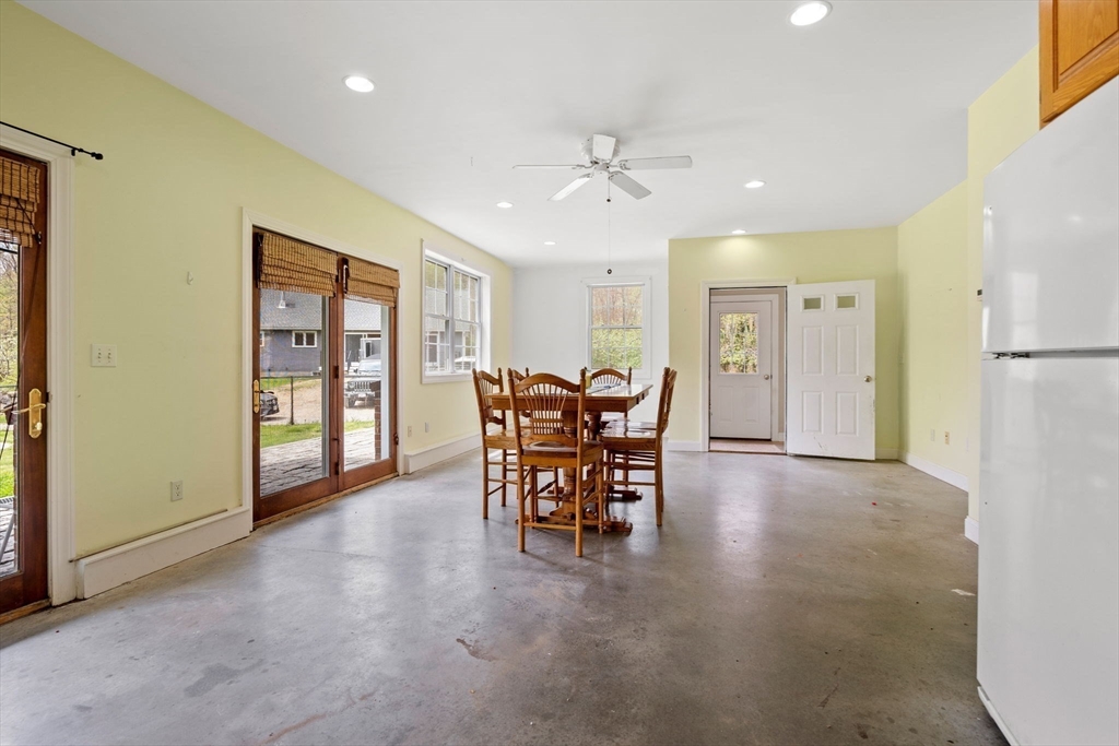 3 Brown Road Townsend, MA 01469 - Photo 27 of 41 a view of a livingroom with furniture and chandelier