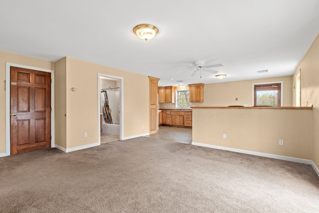 3 Brown Road Townsend, MA 01469 - Photo 31 of 41 a view of a kitchen and a windows an empty room