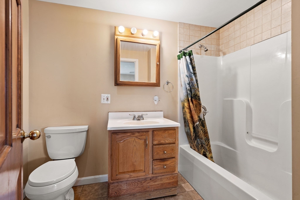 3 Brown Road Townsend, MA 01469 - Photo 35 of 41 a bathroom with a sink a toilet and shower