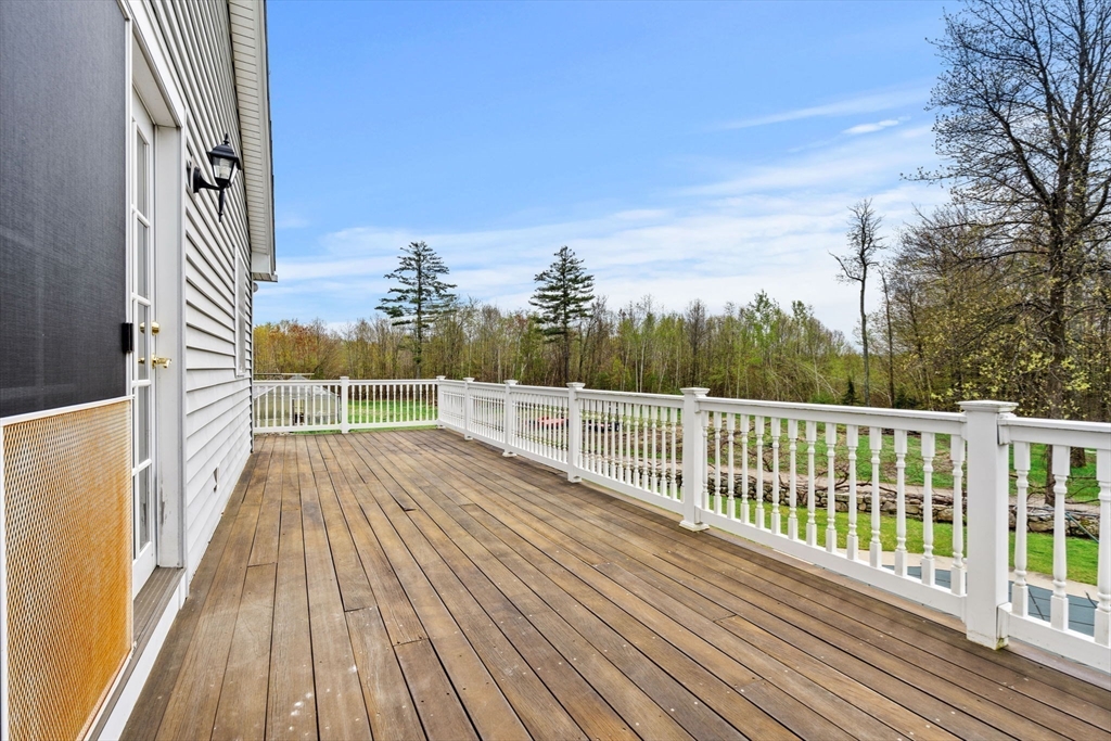 3 Brown Road Townsend, MA 01469 - Photo 36 of 41 a view of a balcony with wooden floor