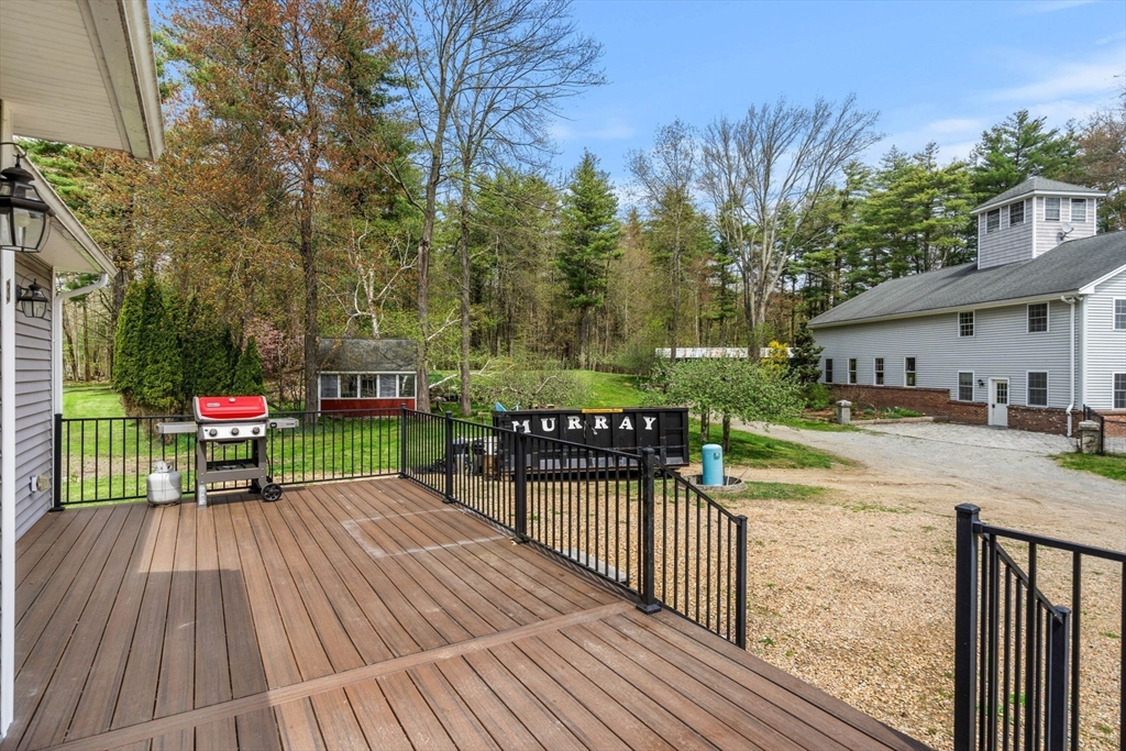 3 Brown Road Townsend, MA 01469 - Photo 10 of 41 a view of a deck with furniture and garden