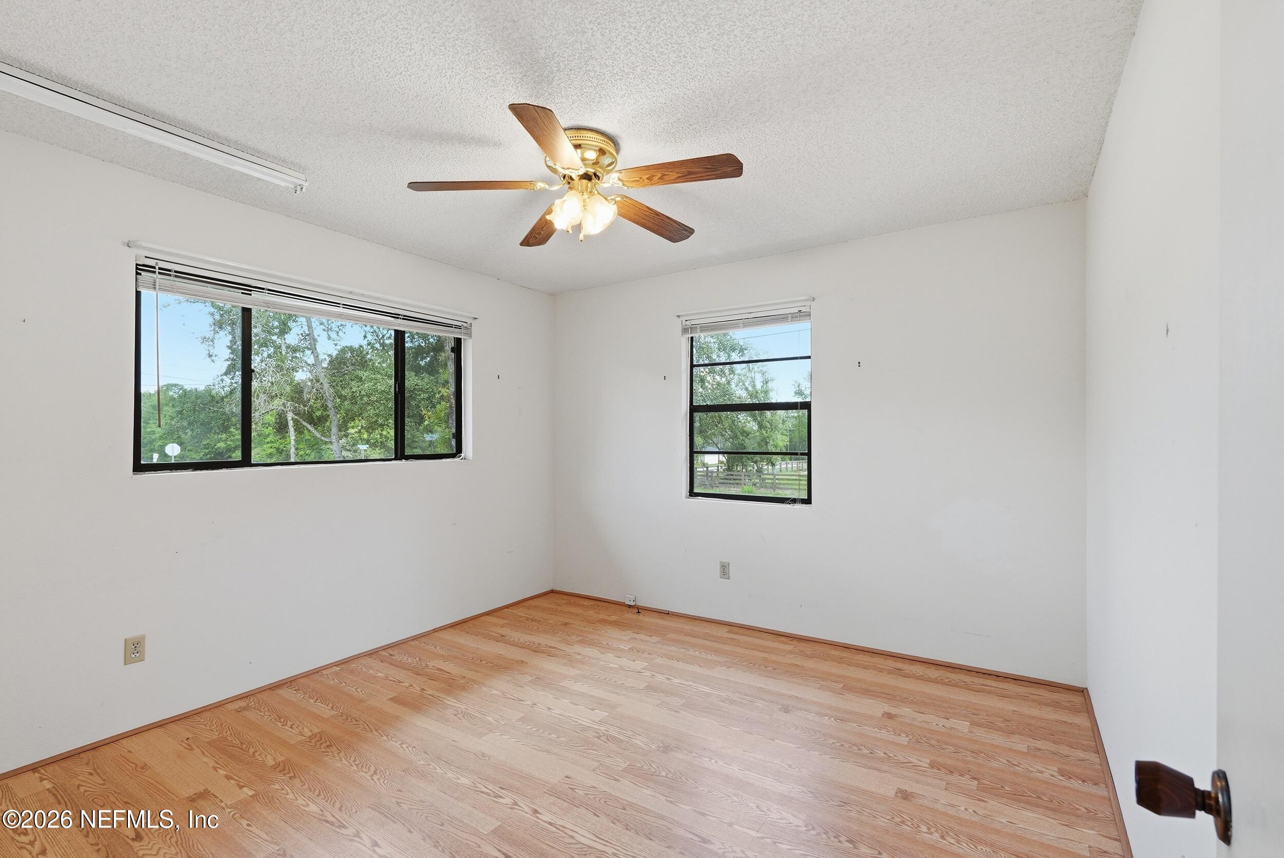 7593 Silver Sands Road Keystone Heights, FL 32656 - Photo 16 of 36 a view of an empty room with a window