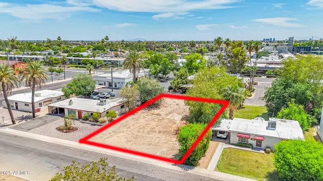 a view of that has two chairs and a table