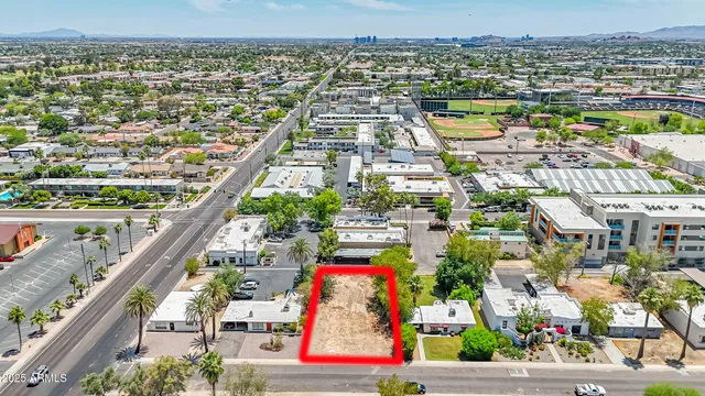 an aerial view of a house with an outdoor space