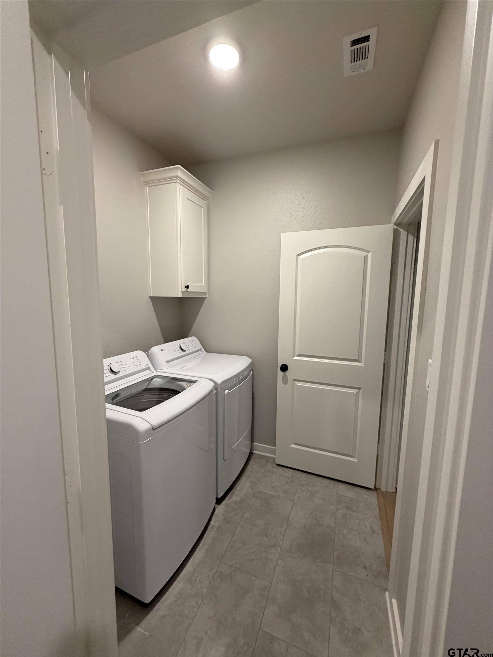 11201 County Road 166 Tyler, TX 75703 - Photo 17 of 19 a utility room with dryer and washer
