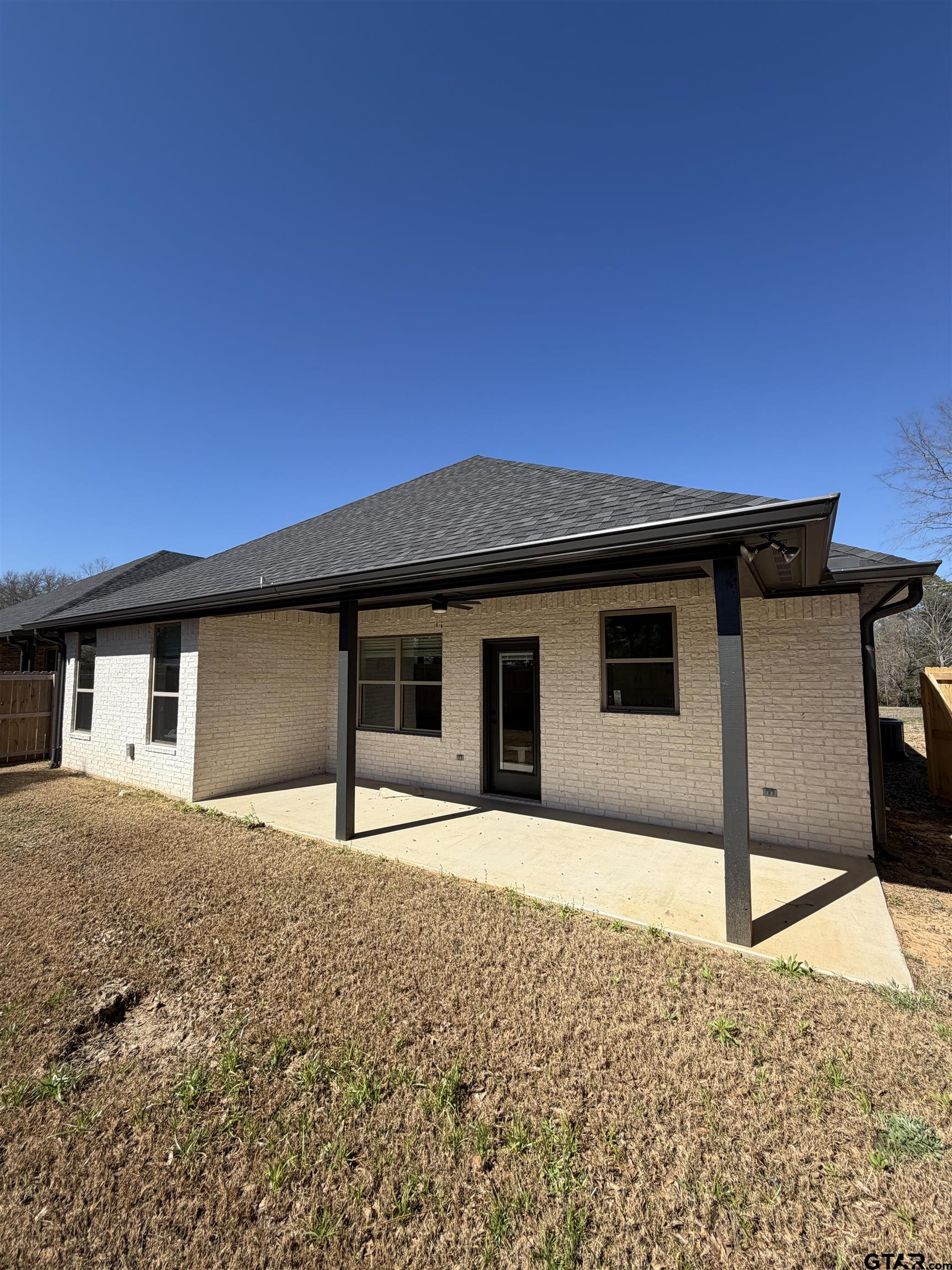 11201 County Road 166 Tyler, TX 75703 - Photo 18 of 19 a house with trees in front of it