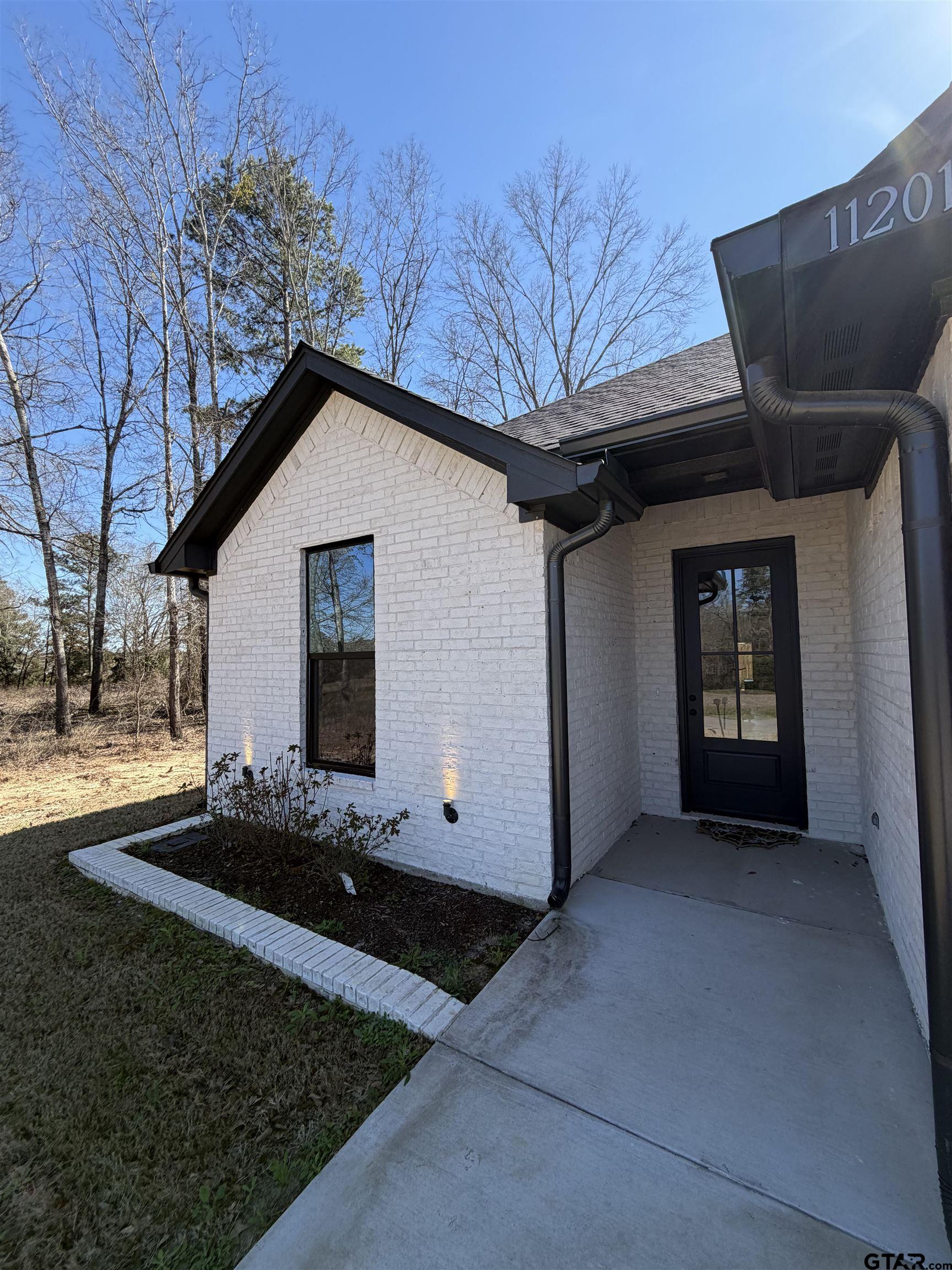 11201 County Road 166 Tyler, TX 75703 - Photo 2 of 19 a view of a house with backyard