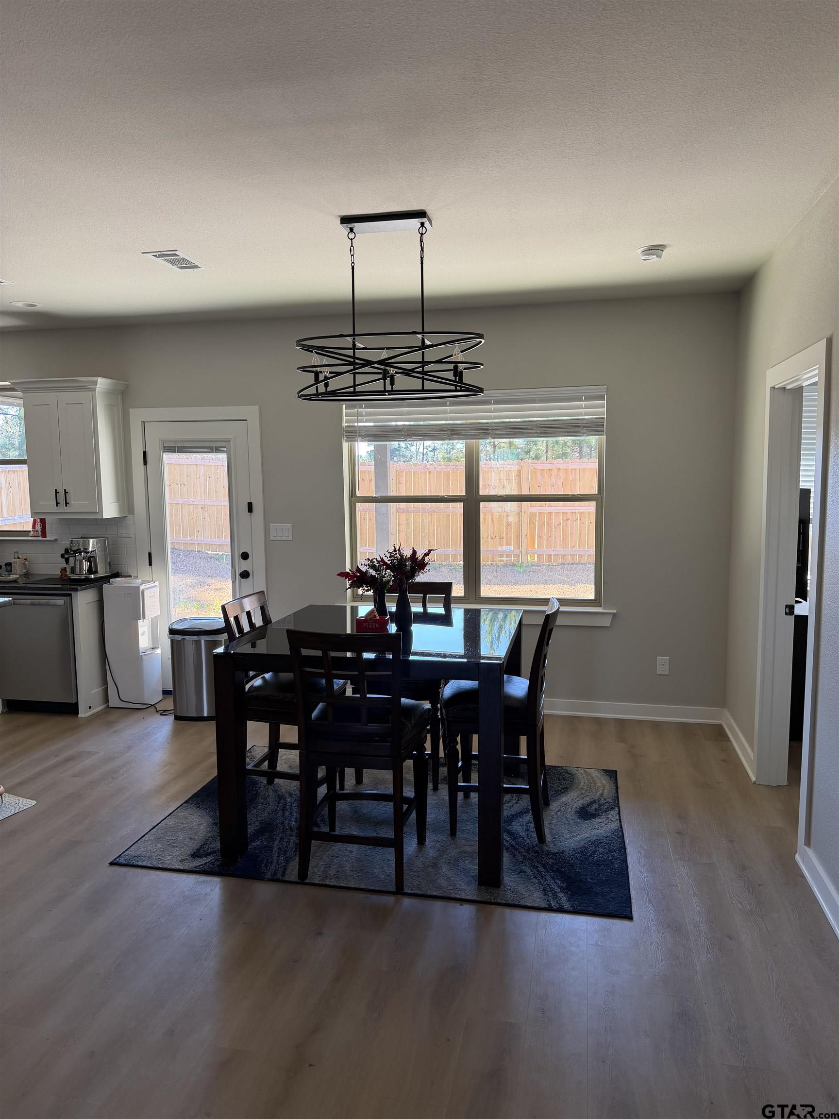 11201 County Road 166 Tyler, TX 75703 - Photo 4 of 19 a view of a dining room with furniture