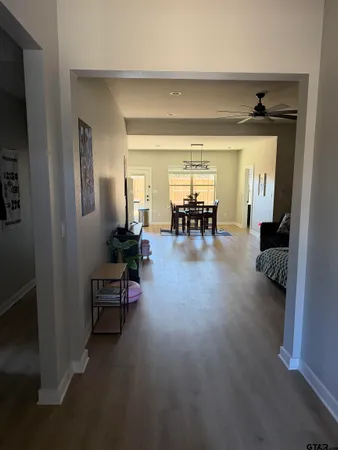 a lobby with furniture and a gate