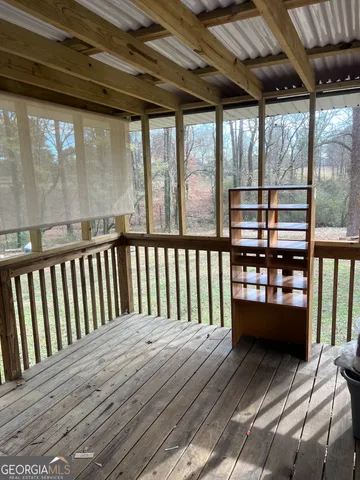 a balcony with wooden floor