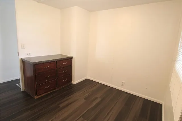 a room with a dresser